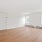 ac units and bright windows in living room