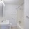 bright vanity with mirrored medicine cabinet over sink