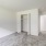 closet in carpeted bedroom