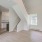 staircase in living room with bright window