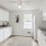 Well-lit kitchen with ample counter space
